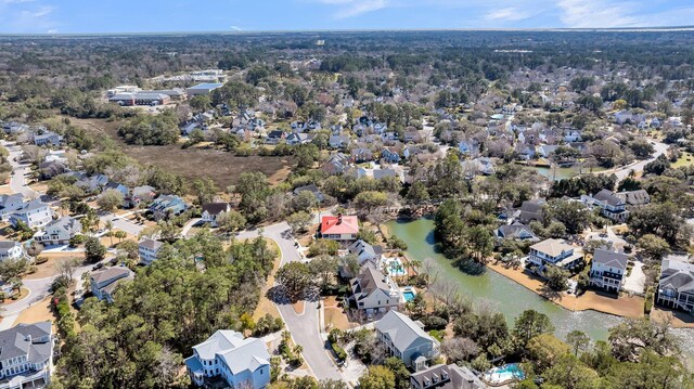 bird's eye view featuring a residential view and a water view