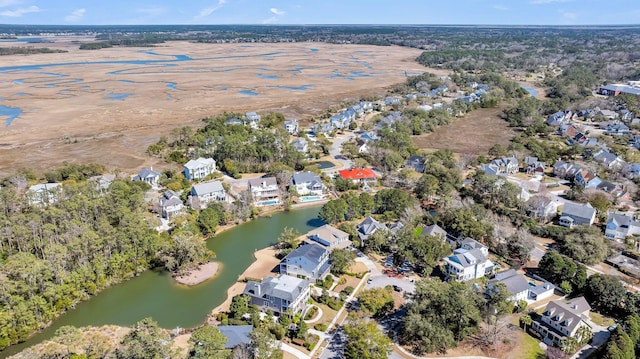 bird's eye view with a water view and a residential view