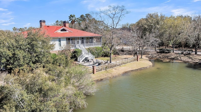 exterior space with a water view