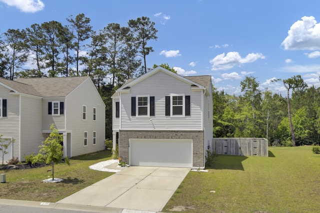 traditional home with a garage, driveway, a front lawn, and brick siding