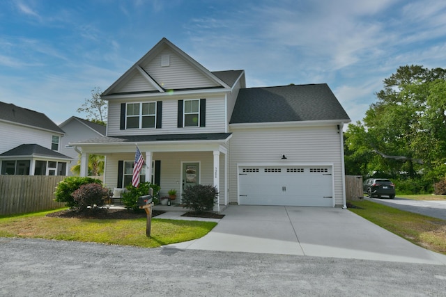view of front facade featuring covered porch, fence, an attached garage, driveway, and a front lawn