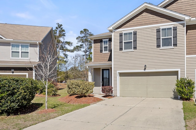 153 Wild Holly Dr, Moncks Corner, SC 29461 - view of front facade featuring a garage and concrete driveway