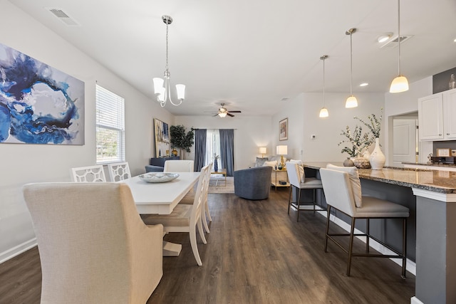 153 Wild Holly Dr, Moncks Corner, SC 29461 - dining area with dark wood-style flooring, a chandelier, a ceiling fan, baseboards, and recessed lighting