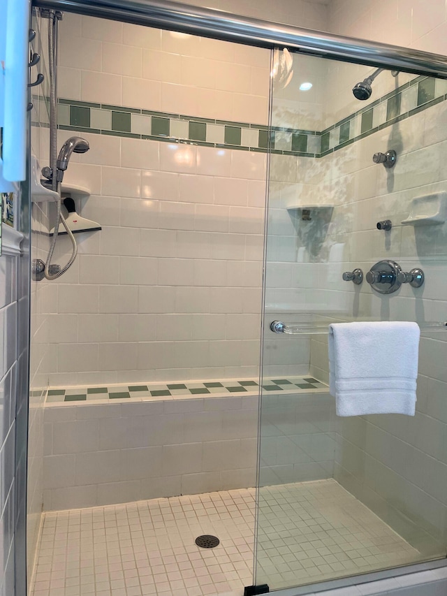 full bathroom featuring a stall shower