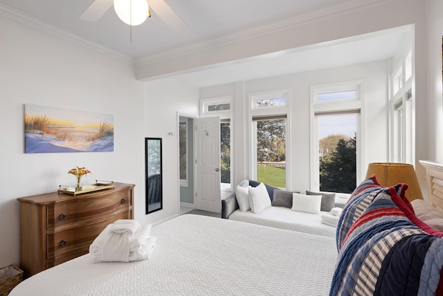 bedroom with ornamental molding and a ceiling fan