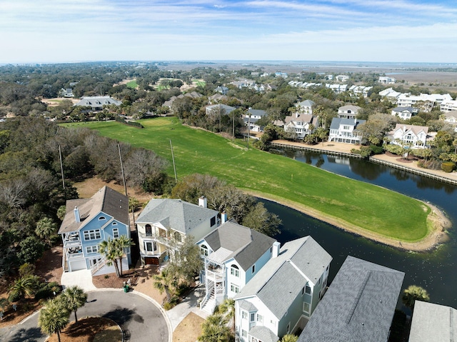 birds eye view of property featuring a residential view, a water view, and golf course view