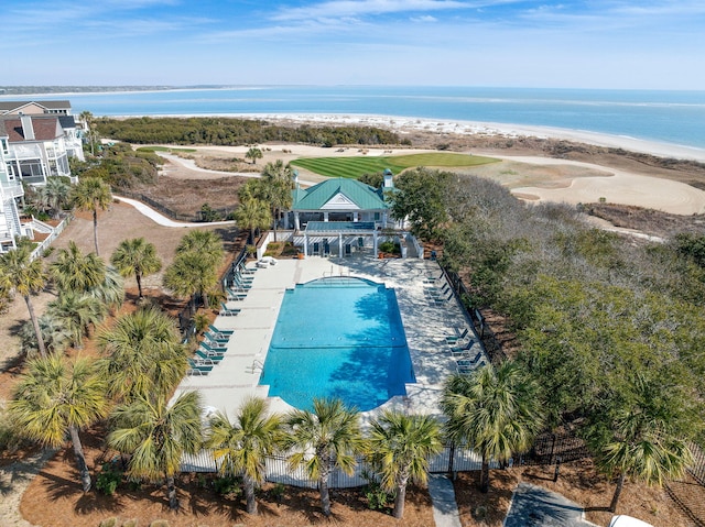 view of pool featuring a water view