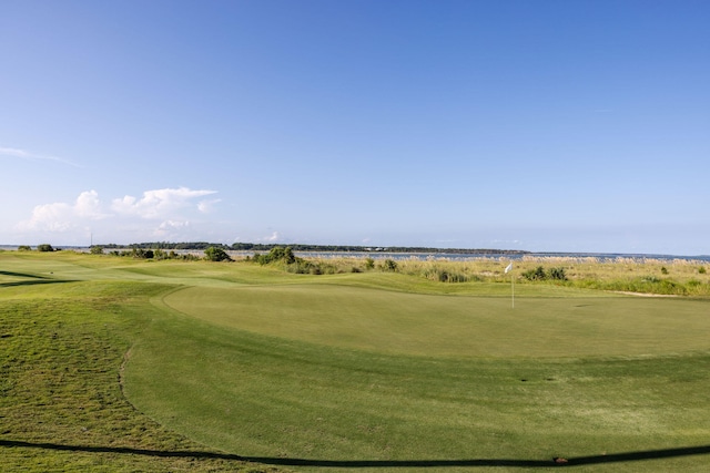 view of property's community with view of golf course