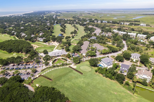 birds eye view of property featuring a water view and golf course view