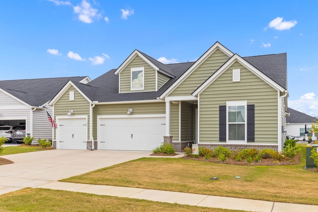 1107 Bellwether Ln, Summerville, SC 29485 - view of front of property featuring a front lawn, concrete driveway, a shingled roof, brick siding, and a garage