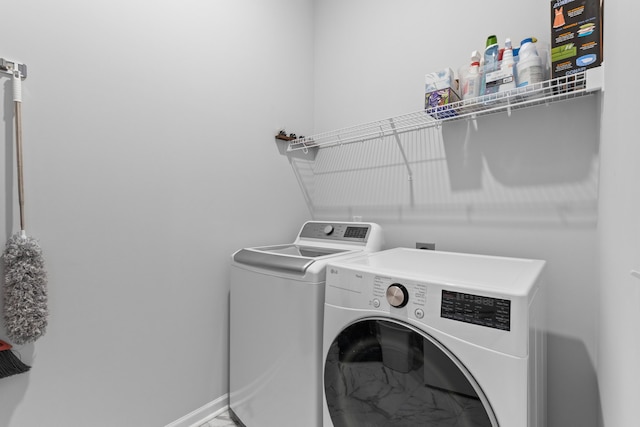 1107 Bellwether Ln, Summerville, SC 29485 - laundry room featuring separate washer and dryer and marble look tile flooring