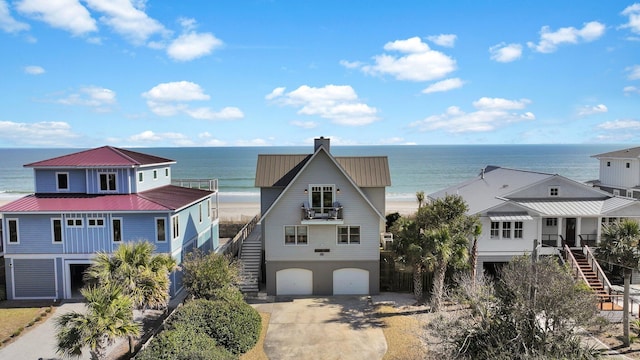 exterior space with a water view