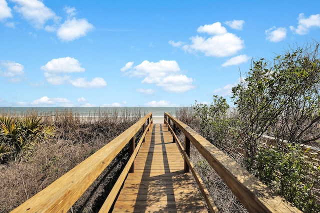 dock area featuring a water view