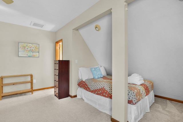 bedroom featuring carpet, visible vents, and baseboards