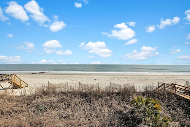 property view of water featuring a beach view