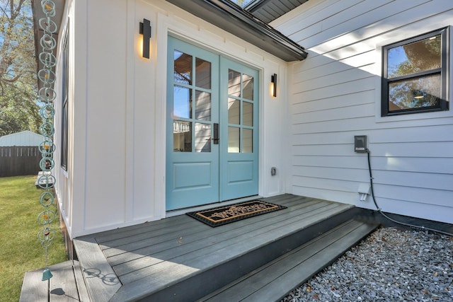 property entrance featuring french doors