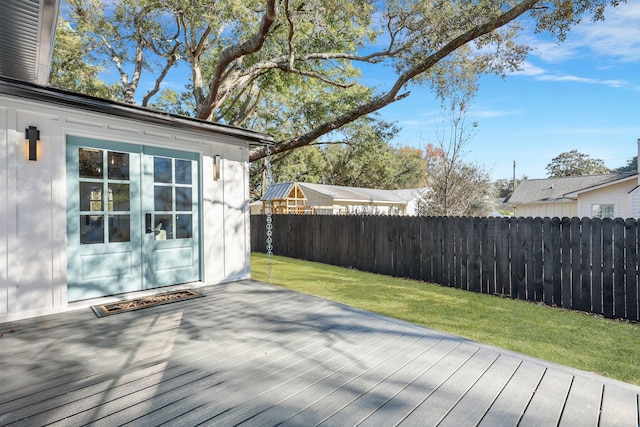 deck featuring a yard