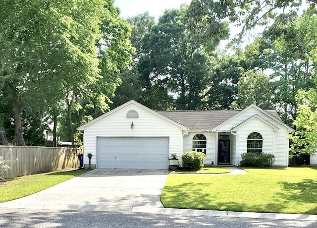3415 Pawtucket St, Charleston, SC 29414 - ranch-style home featuring a garage, driveway, and view of scattered trees
