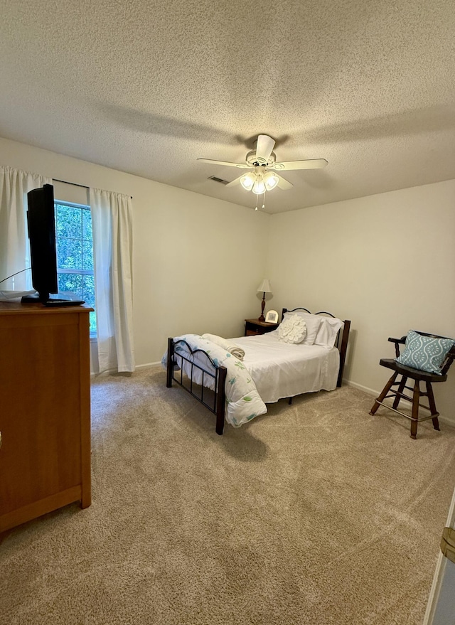 3415 Pawtucket St, Charleston, SC 29414 - bedroom with carpet floors, a textured ceiling, ceiling fan, and baseboards