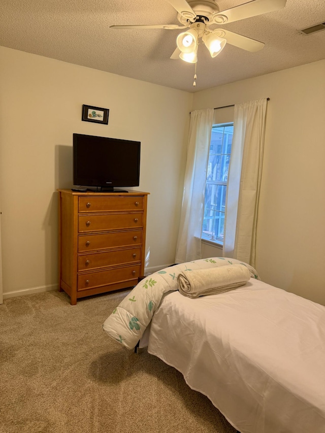 3415 Pawtucket St, Charleston, SC 29414 - bedroom with carpet flooring, ceiling fan, a textured ceiling, and baseboards