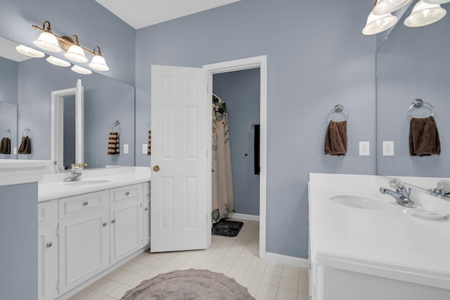 bathroom with vanity and tile patterned flooring