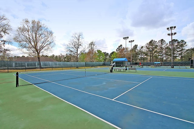 view of sport court featuring basketball hoop