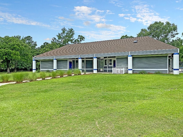 ranch-style home with a front yard