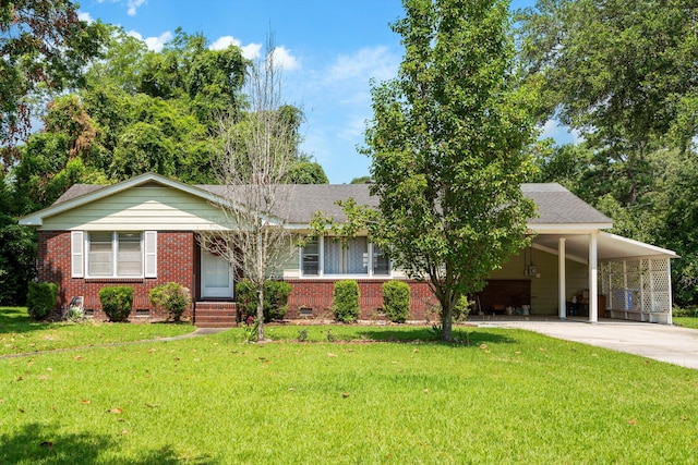1900 Morgan Ave, North Charleston, SC 29406 - view of front of house featuring brick siding, concrete driveway, entry steps, and a carport