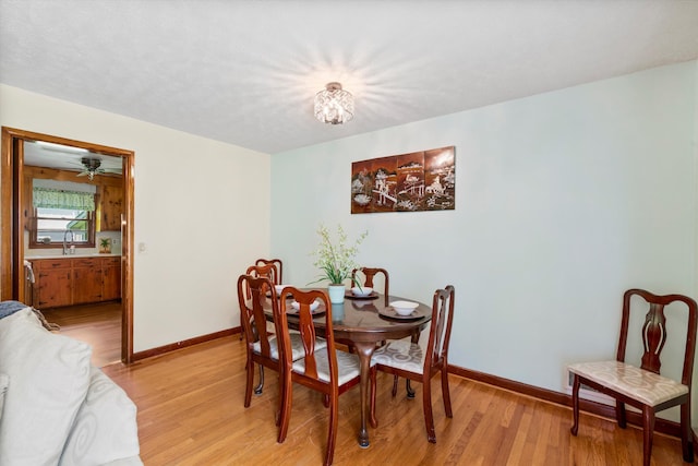 1900 Morgan Ave, North Charleston, SC 29406 - dining space with light wood-style floors and baseboards