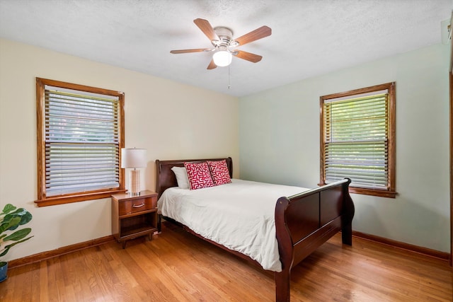 1900 Morgan Ave, North Charleston, SC 29406 - bedroom with light wood-style floors and a ceiling fan