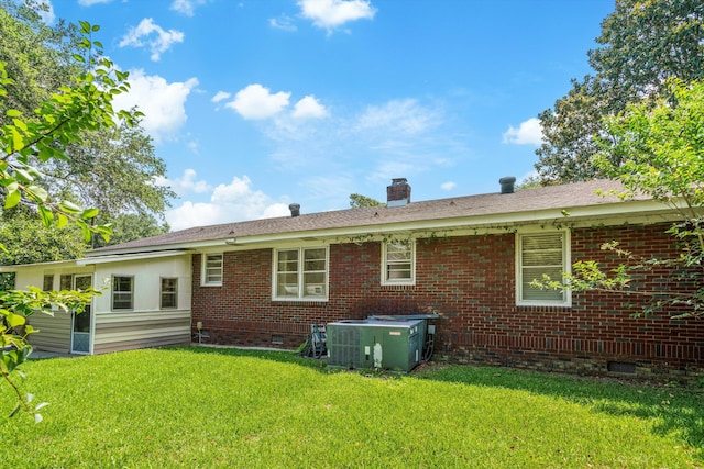 1900 Morgan Ave, North Charleston, SC 29406 - back of house featuring crawl space, a lawn, brick siding, and a chimney