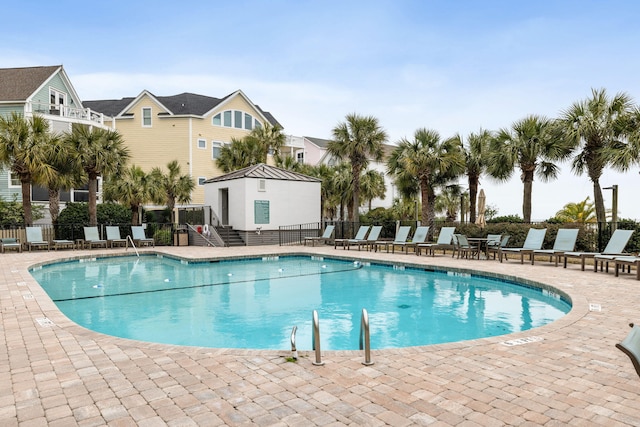 view of swimming pool with a patio