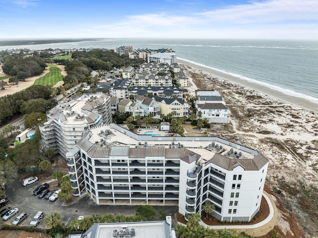 bird's eye view featuring a beach view and a water view