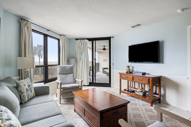 living room featuring a textured ceiling