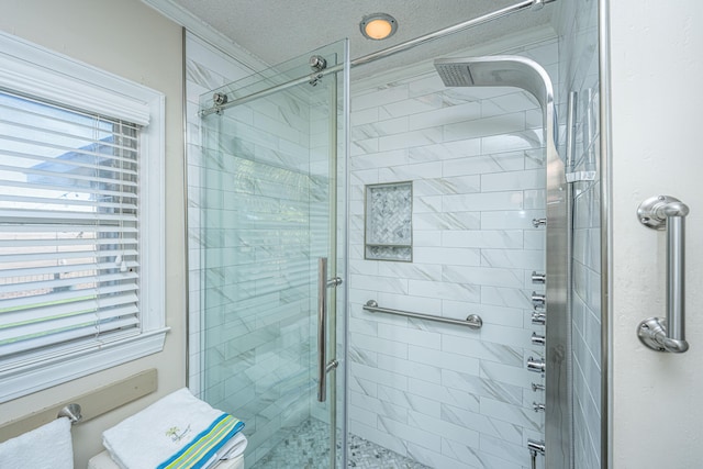 bathroom featuring toilet, crown molding, and walk in shower