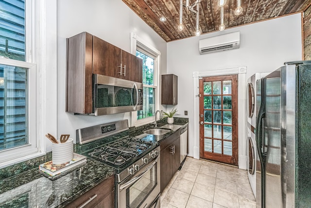 173 Fishburne St, Charleston, SC 29403 - kitchen with appliances with stainless steel finishes, a sink, a wall mounted air conditioner, dark brown cabinetry, and wood ceiling