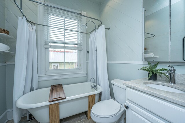 173 Fishburne St, Charleston, SC 29403 - full bath featuring a freestanding tub, plenty of natural light, vanity, and toilet