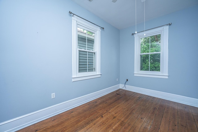173 Fishburne St, Charleston, SC 29403 - empty room featuring baseboards and dark wood-style flooring