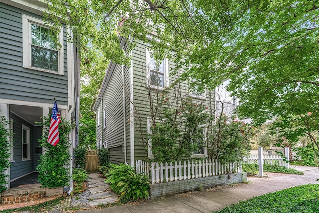 173 Fishburne St, Charleston, SC 29403 - view of side of home with a fenced front yard