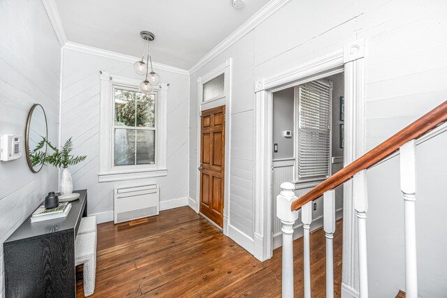 173 Fishburne St, Charleston, SC 29403 - entryway featuring crown molding, dark wood-style flooring, and baseboards