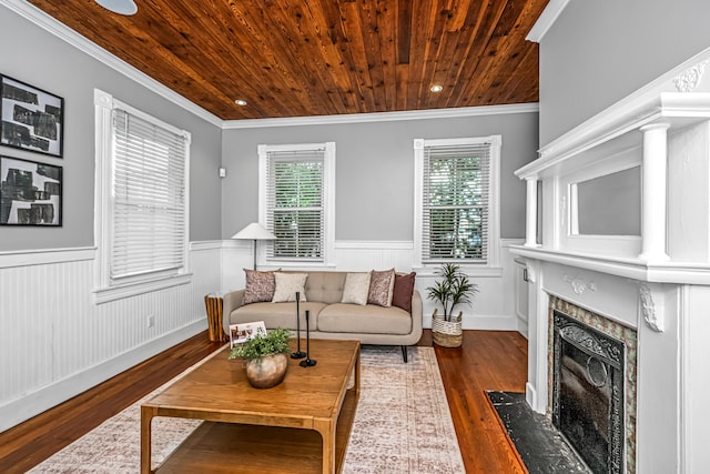 173 Fishburne St, Charleston, SC 29403 - living area with wooden ceiling, a high end fireplace, dark wood finished floors, a wainscoted wall, and ornamental molding