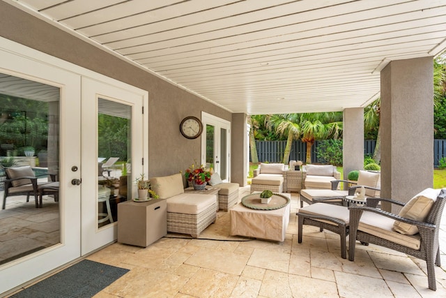 view of patio featuring french doors and an outdoor living space