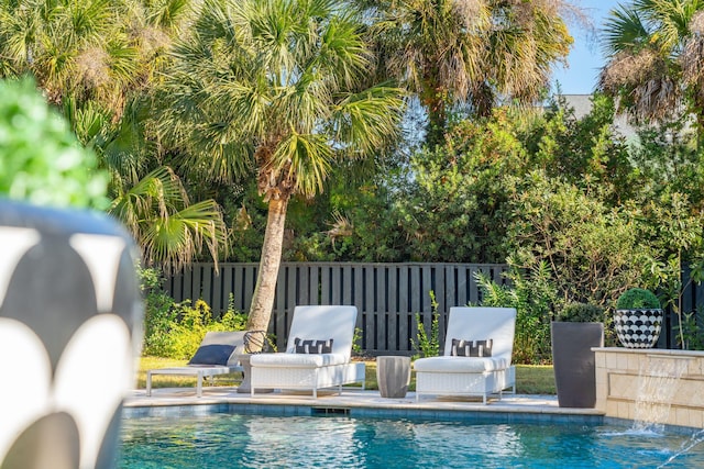 view of pool featuring pool water feature