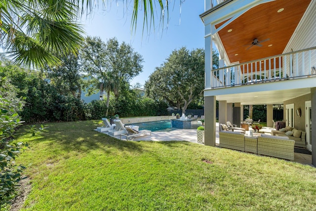 view of yard with a balcony, a patio area, and an outdoor hangout area