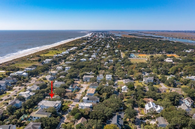 bird's eye view featuring a water view and a view of the beach