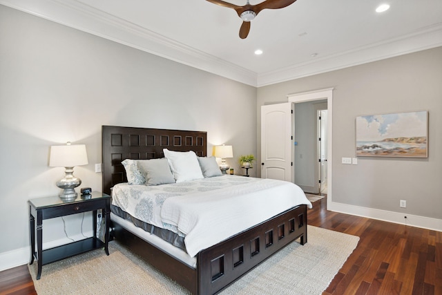 bedroom featuring wood-type flooring, ceiling fan, and crown molding