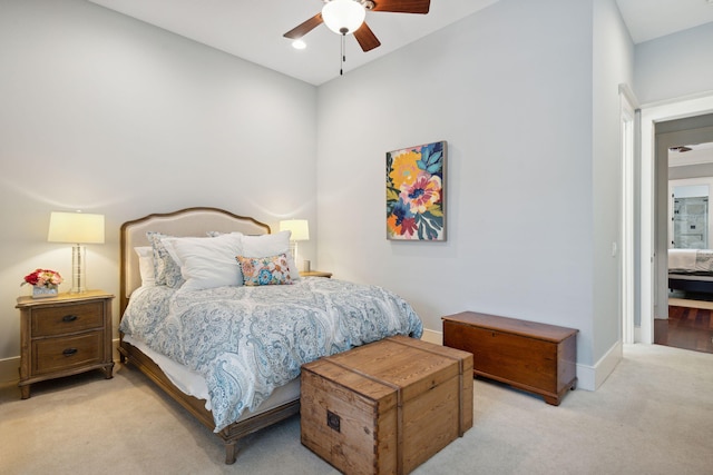 carpeted bedroom featuring ceiling fan