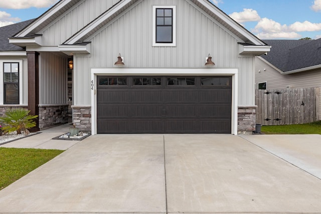 404 Omaha Dr, Moncks Corner, SC 29461 - modern inspired farmhouse featuring stone siding, driveway, and board and batten siding