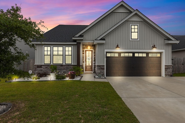 404 Omaha Dr, Moncks Corner, SC 29461 - view of front of home featuring board and batten siding, concrete driveway, stone siding, and roof with shingles