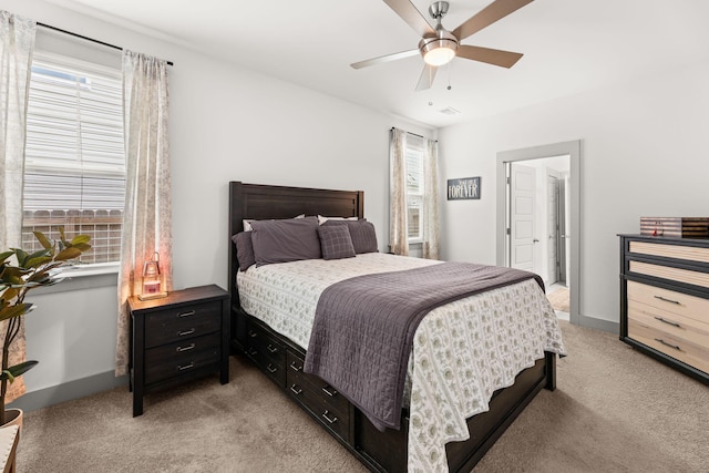 404 Omaha Dr, Moncks Corner, SC 29461 - bedroom with light carpet, baseboards, and ceiling fan